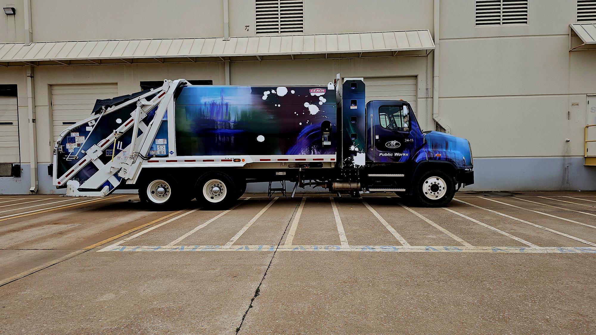 Utility truck equipped with amber warning lights for public works and roadside operations