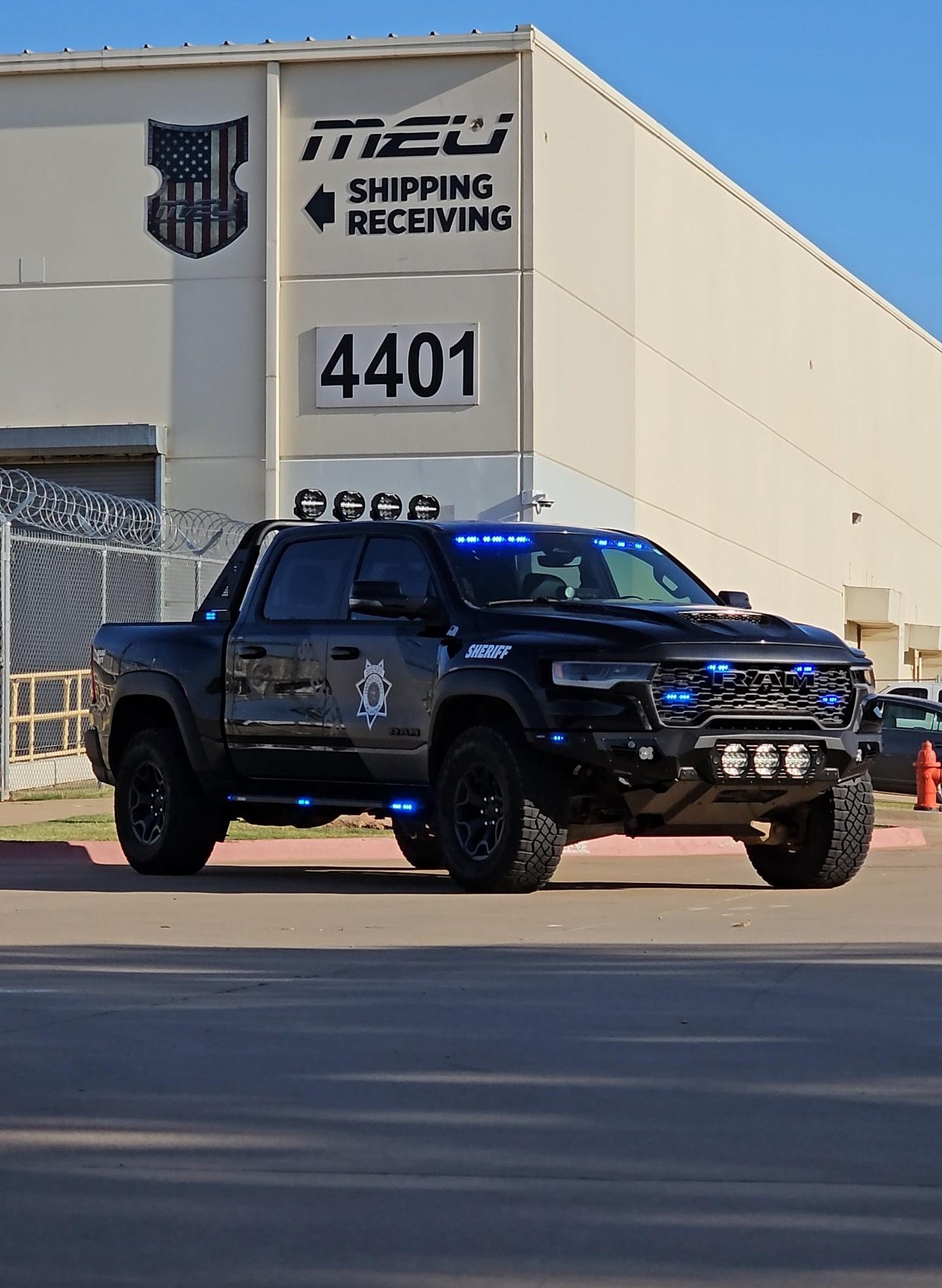 Emergency vehicle undergoing a full custom upfit inside a professional installation facility